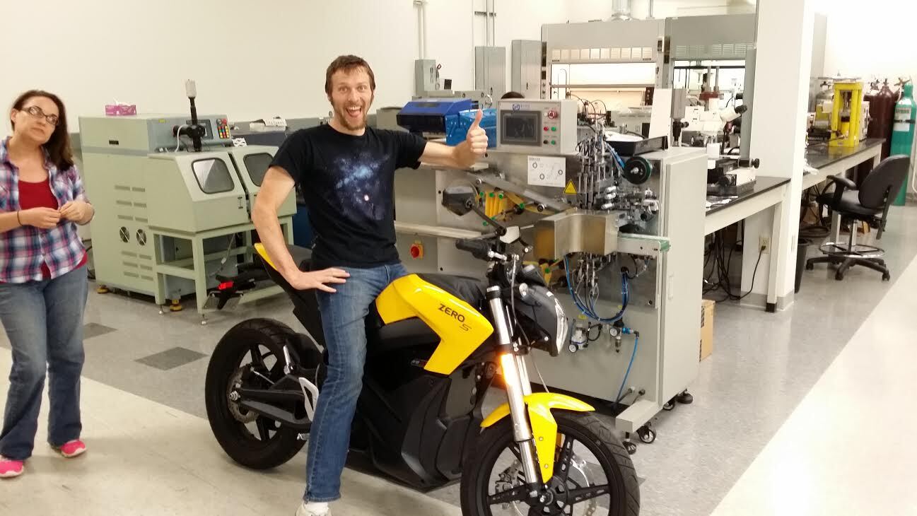 An enthusiastic Luke Workman on a Zero S at the Zero factory in Scotts Valley, California