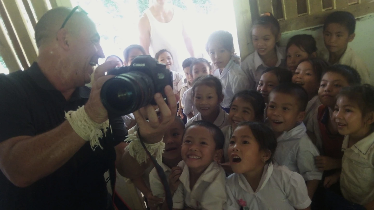 In our first school, I began taking pictures and checking that I'd got what I wanted on the screen on the back of the camera. One of the children realized what I was doing and when I saw the expression on his face, I showed him and scrolled through the images I'd just taken. It didn't take long for me to realize most of the children had never seen a digital camera before. On one level I felt like a magician, with the knowledge of a thousand years into the future in my hands. On another level, I feared for their future.