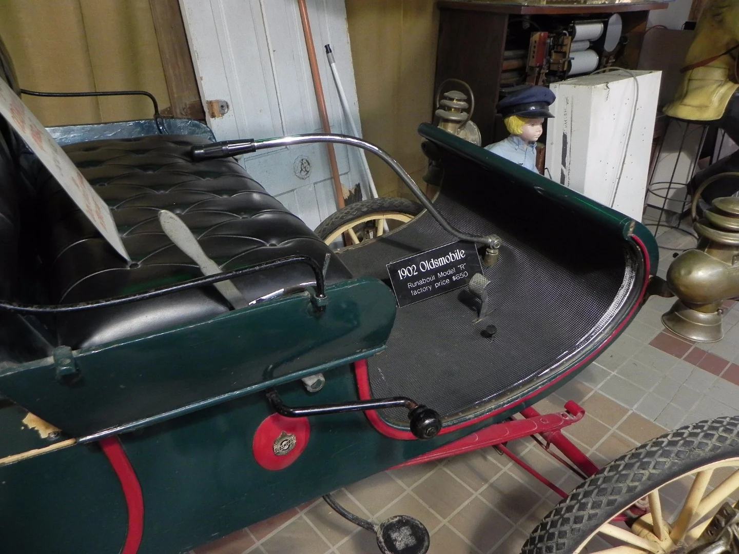 The tiller guided the Olds Curved Dash while traveling at speeds up to 20 mph