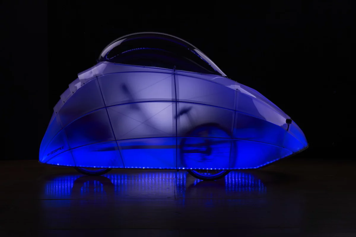 The FireFly recumbent tricycle outfitted with an LED-lit dome