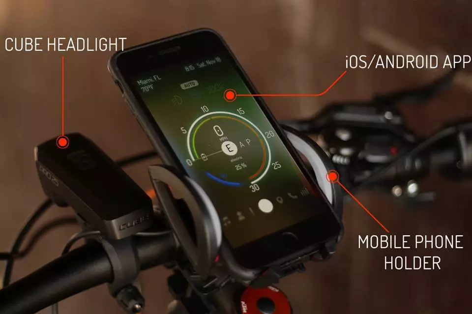 Nireeka carbon e-bike: your smartphone clips in to become the dash in a charging cradle