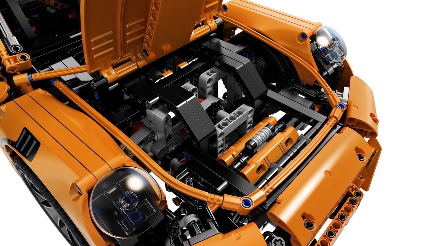 Among the more intricate features that you'd expect to find in a Technic model are a fully functional double-clutch transmission with four gears, a steering wheel with gearshift paddles, and a six-cylinder flat (or boxer) engine with moving pistons