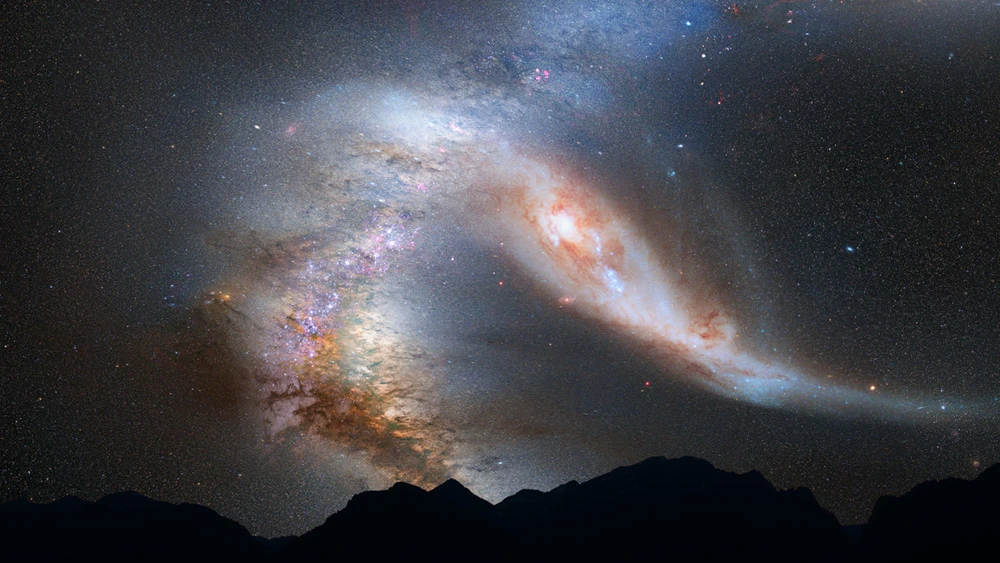 Four billion years from now, after its first close pass through the Milky Way, a view of Earth's nighttime sky shows that M31 is tidally stretched out and the Milky Way is also warped (Image: NASA / STScI)