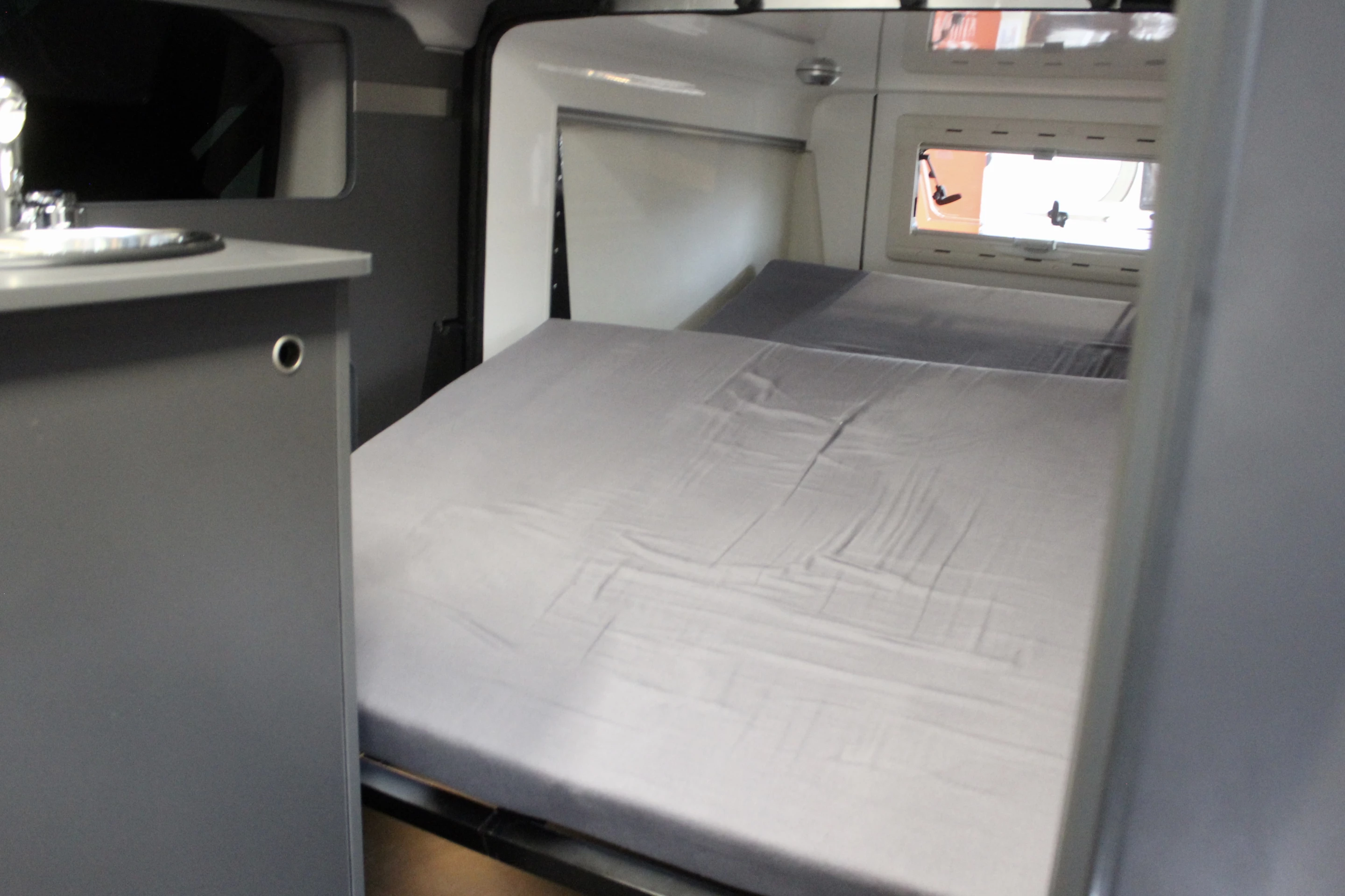 The Beauer bed automatically folds as the pod retracts into the van