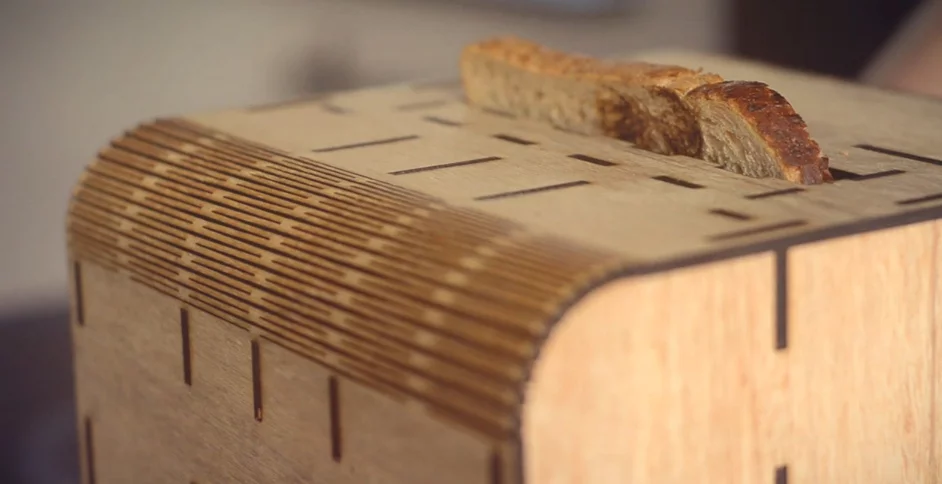 The image-embossed bread popping out of the Super Mega Mega Toaster