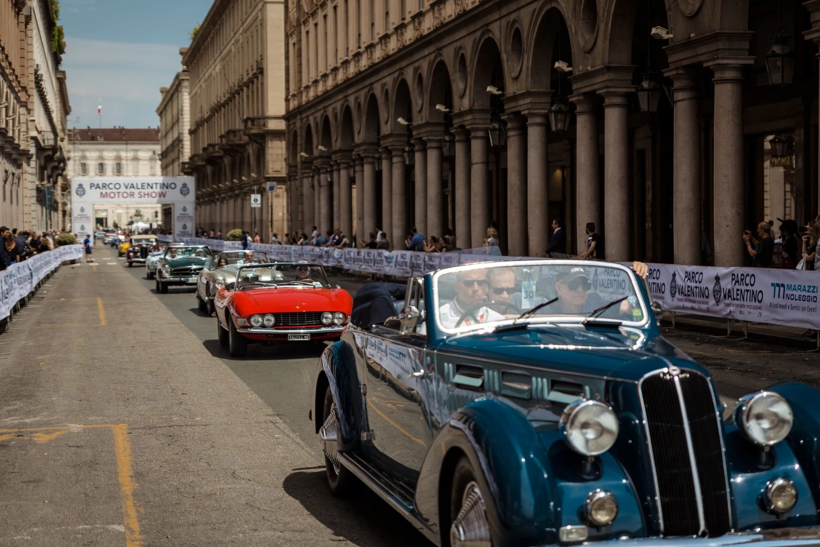 The contestants parade on the streets of Turin, taking the same streets once used by the likes of Ascari, Farina and Fangio in the Valentino F1 Grand Prix