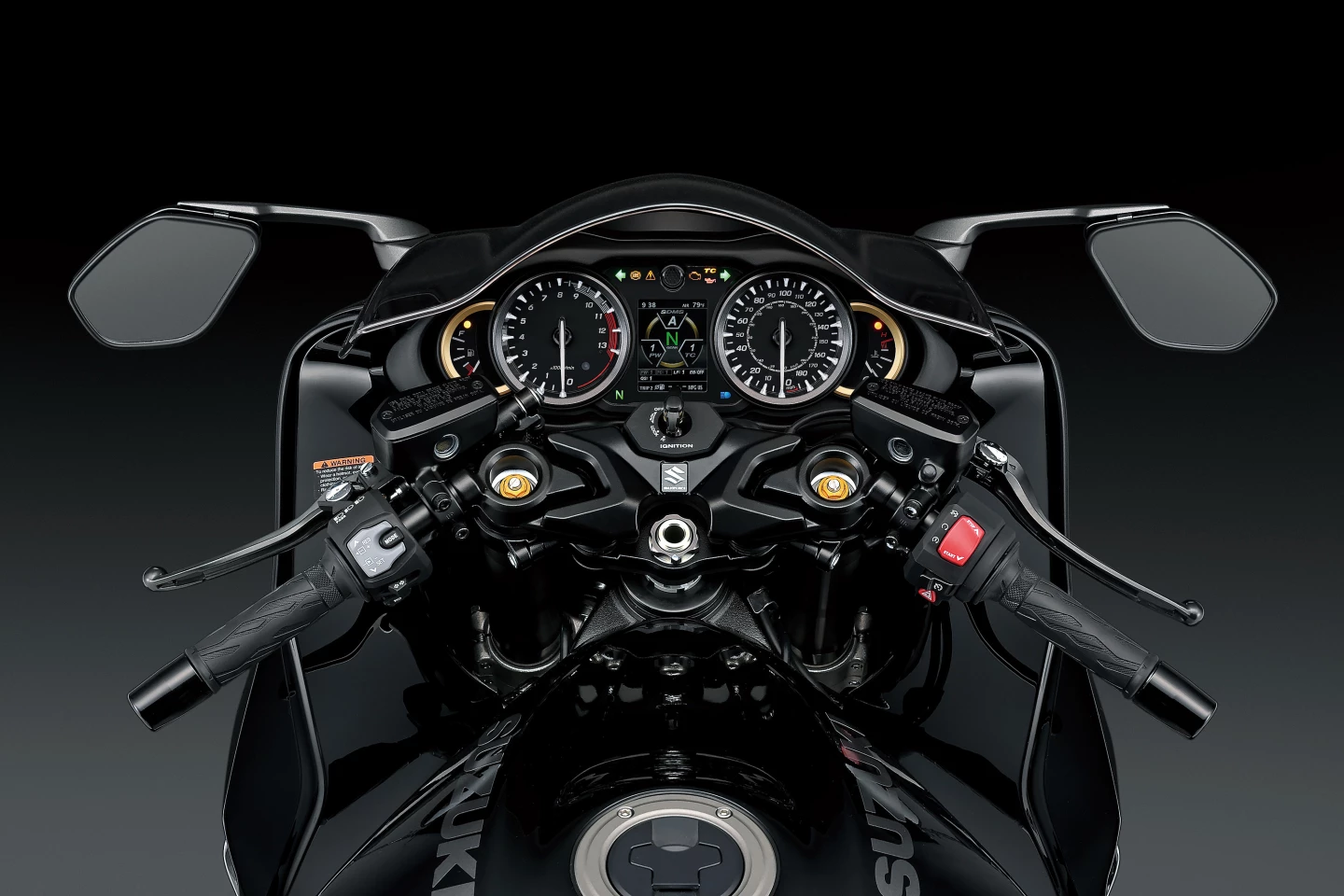 Cockpit and switchgear features big twin analog dials surrounding a small color LCD