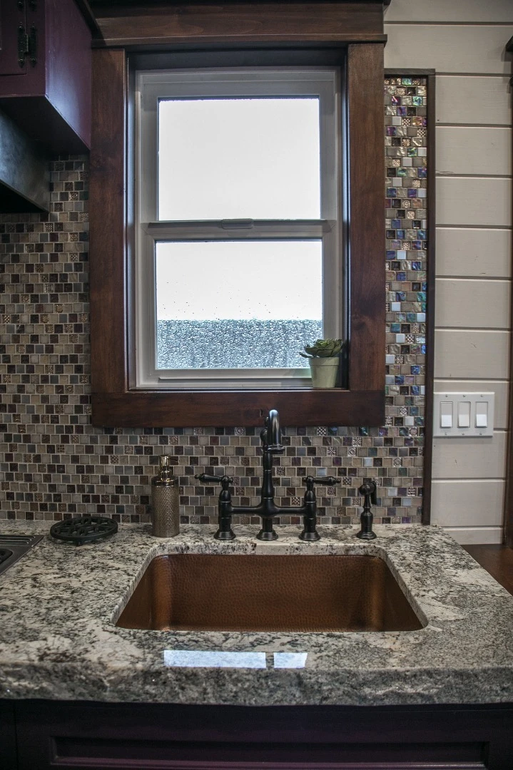 The Tudor-style tiny house's kitchen sink