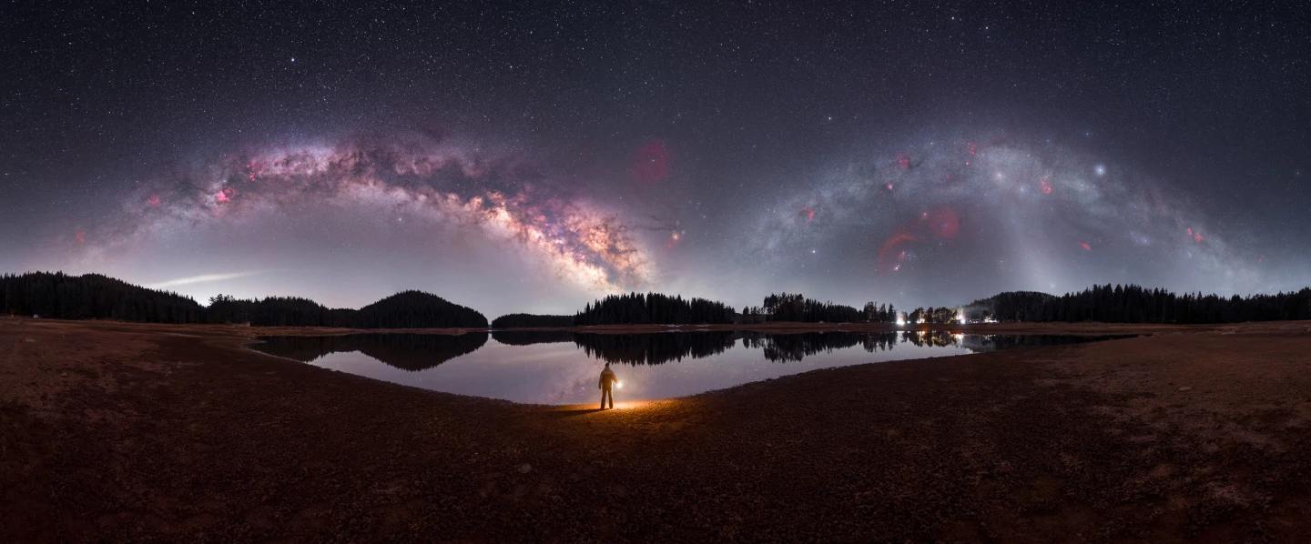 The Eyes of the Universe by Mihail Minkov, taken in Bulgaria. This incredible image showcases what it might look like if the Milky Way we see in summer and the version visible in winter were both present in the sky at the same time. This involved taking photos from the same spot at different times of the year and blending them together into one 360-degree panorama.