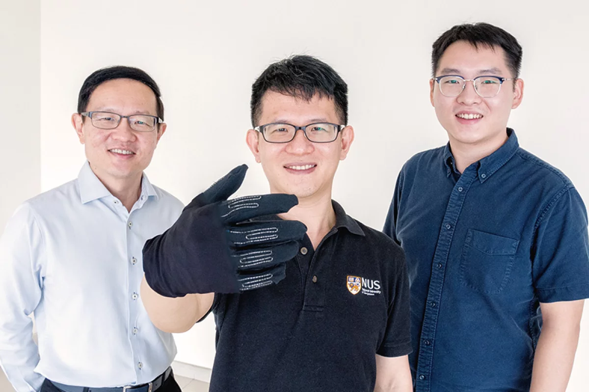 The InfinityGlove team, Prof. Lim Chwee Teck (left), Dr. Yeo Joo Chuan and Dr. Yu Longteng