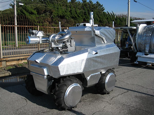 The Water Cannon Robot and Hose Extension Robot are both built on the frames of small farm buggies