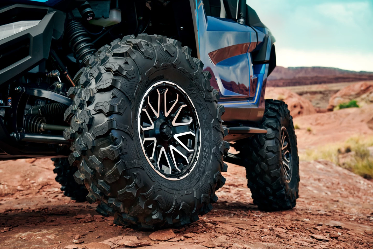 The Wolverine RMAX2 1000 rides on rugged 30-in tires