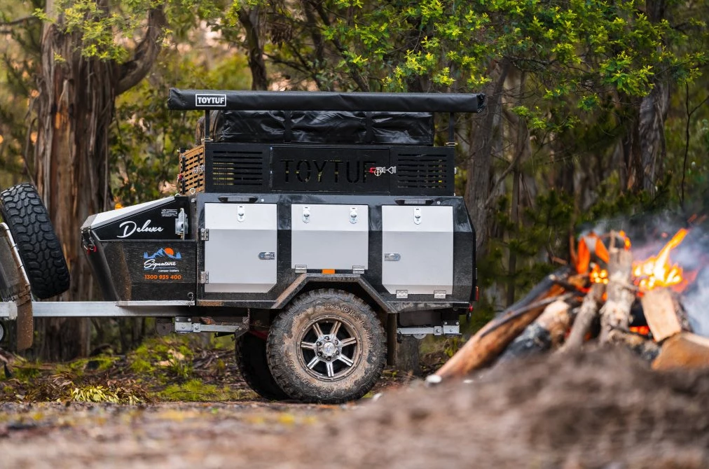 At 13.3 feet long and 2,200 lb, the Deluxe II is a compact but rock-solid adventure trailer