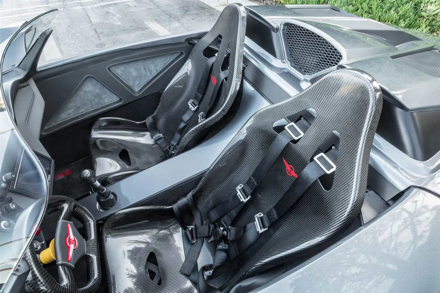 The Beast has carbon fiber seats and steering wheel
