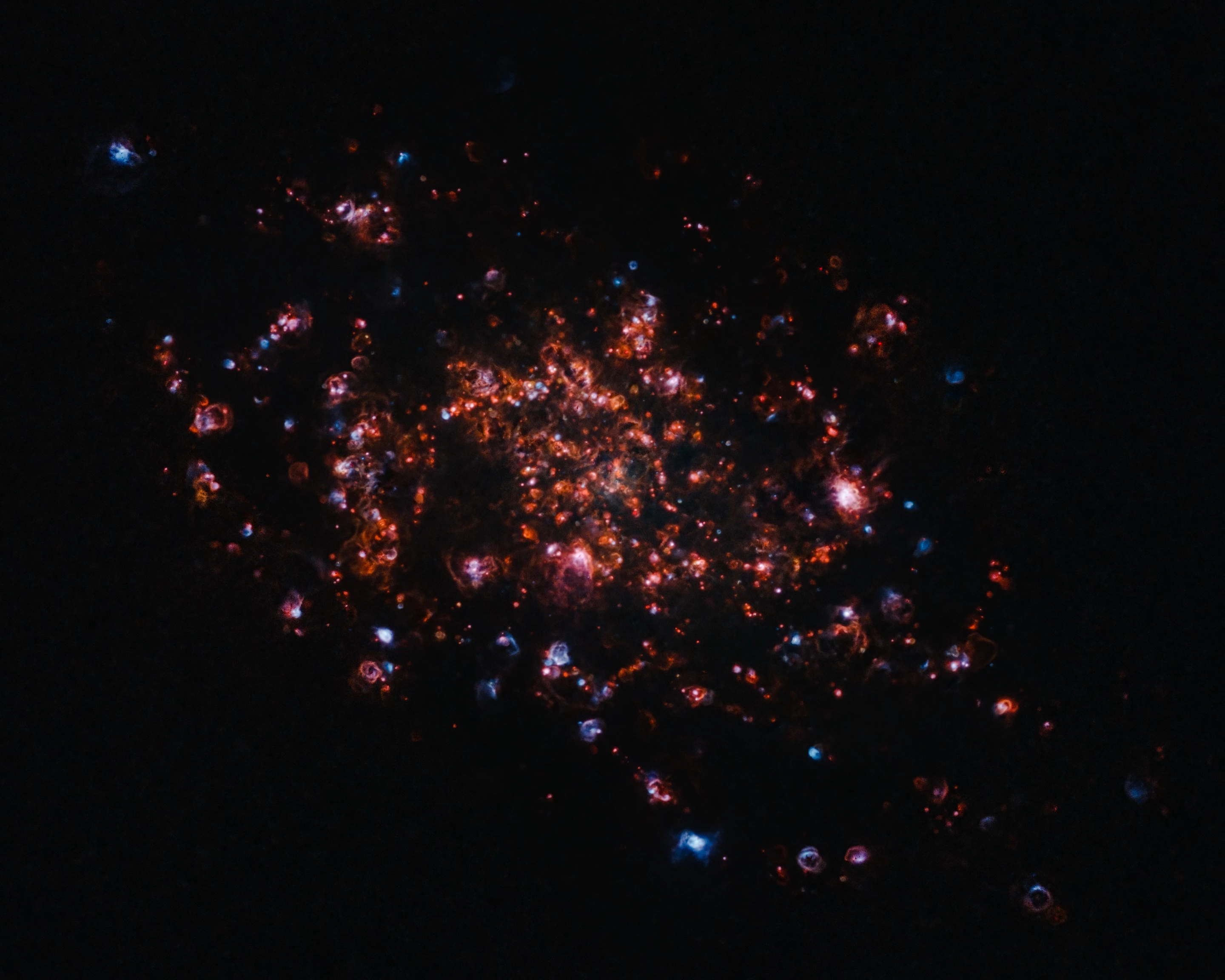 Runner Up - Galaxies. The Nebulae of the Triangulum Galaxy. Mayhill, New Mexico, USA. Takahashi FSQ106 EDX4 530 mm telescope at f/5 and PlaneWave 14" CDK 2543 mm telescope at f/7.2, Chroma filters, Software Bisque Paramount MX+ and Paramount ME-II mounts, RB-SII-Ha-OIII composite, 49.5 hours total exposure