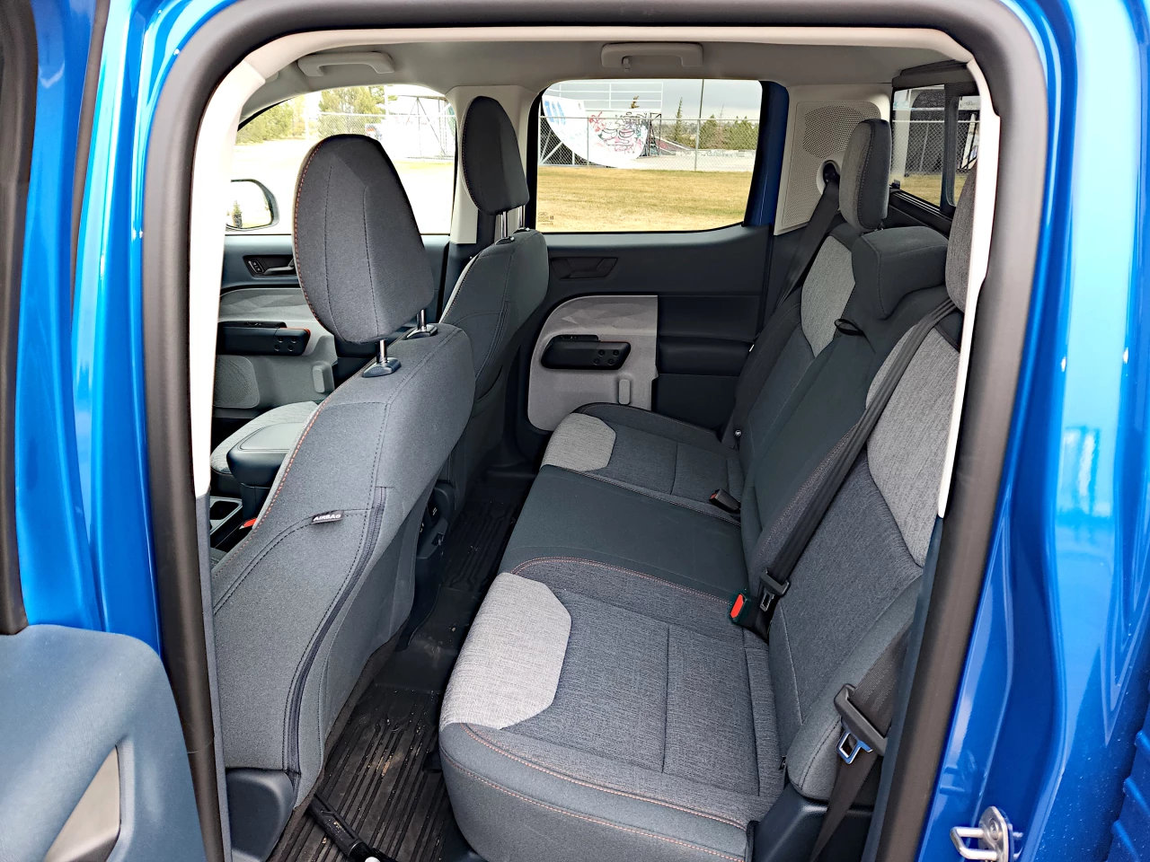 Rear seating in the compact Ford Maverick is cramped, as would be expected
