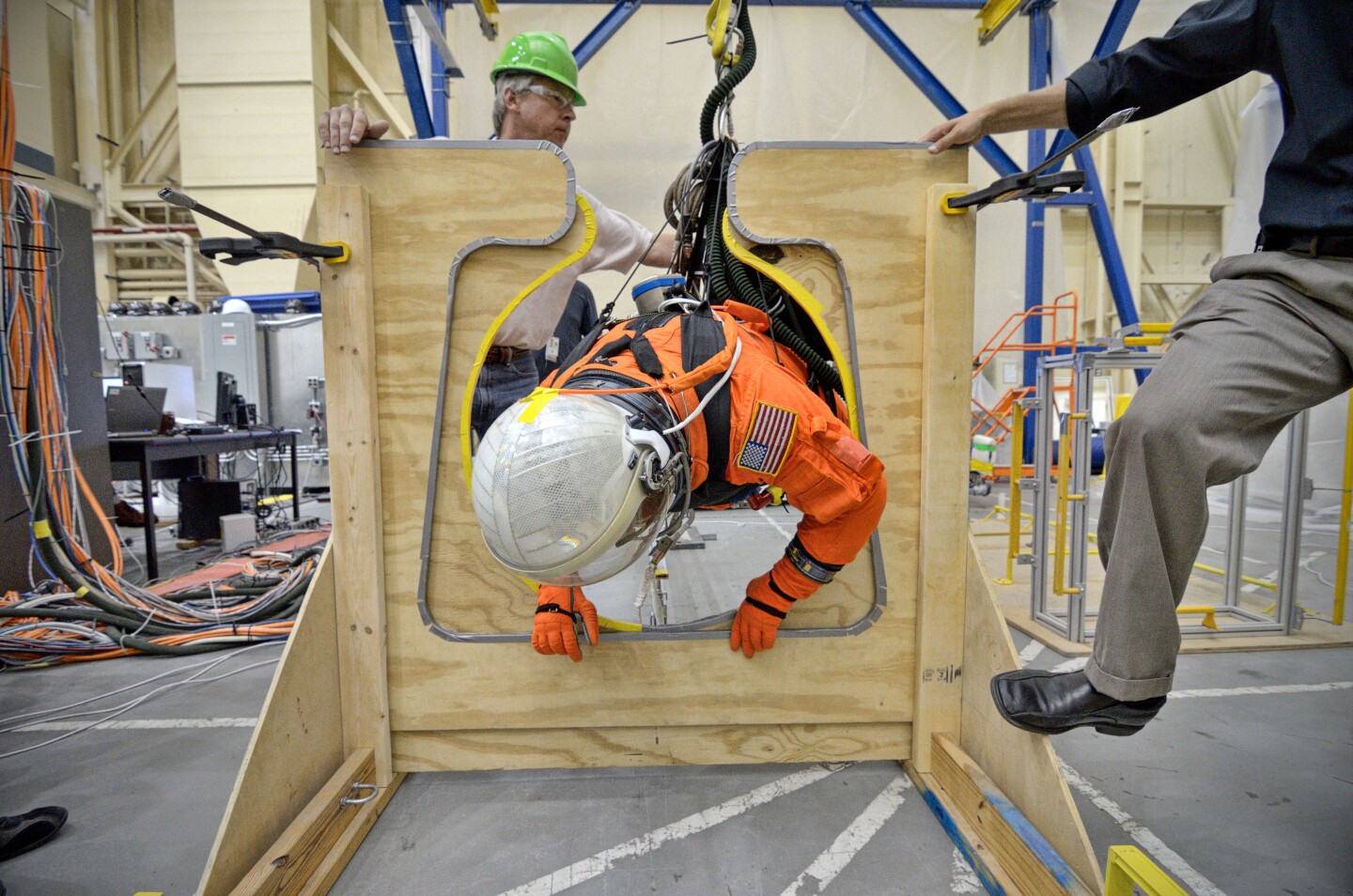 The tests include moving through hatches (Image: NASA)