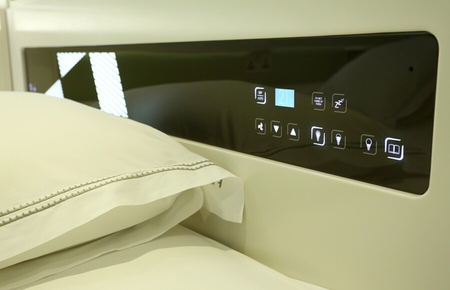 A control panel is built into the headboard of beds in hub by Premier Inn hotels, which allows guests to control the room facilities in the same way that they can using the smartphone app