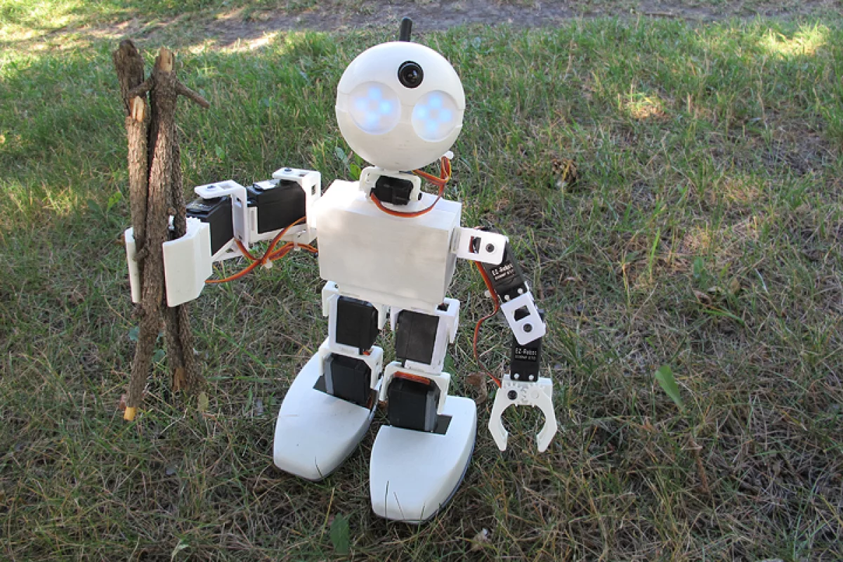The Revolution JD is a humanoid robot with two-fingered grippers