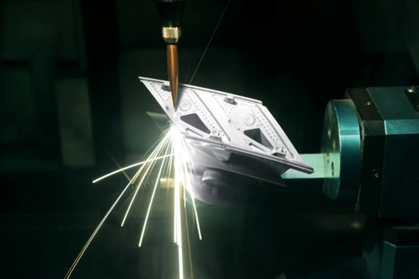 Jet turbine blades are drilled with holes by laser to allow cooling air to circulate through them (Photo: GE Aviation)