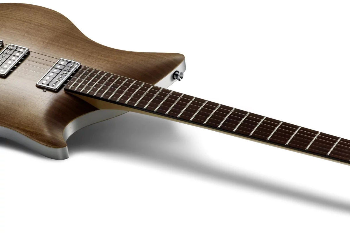 Pickups are selected using touch sensors under the volume and tone knobs