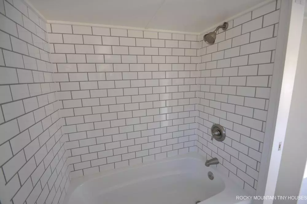 The Ad Astra's bathroom is relatively spacious and includes a bath/shower