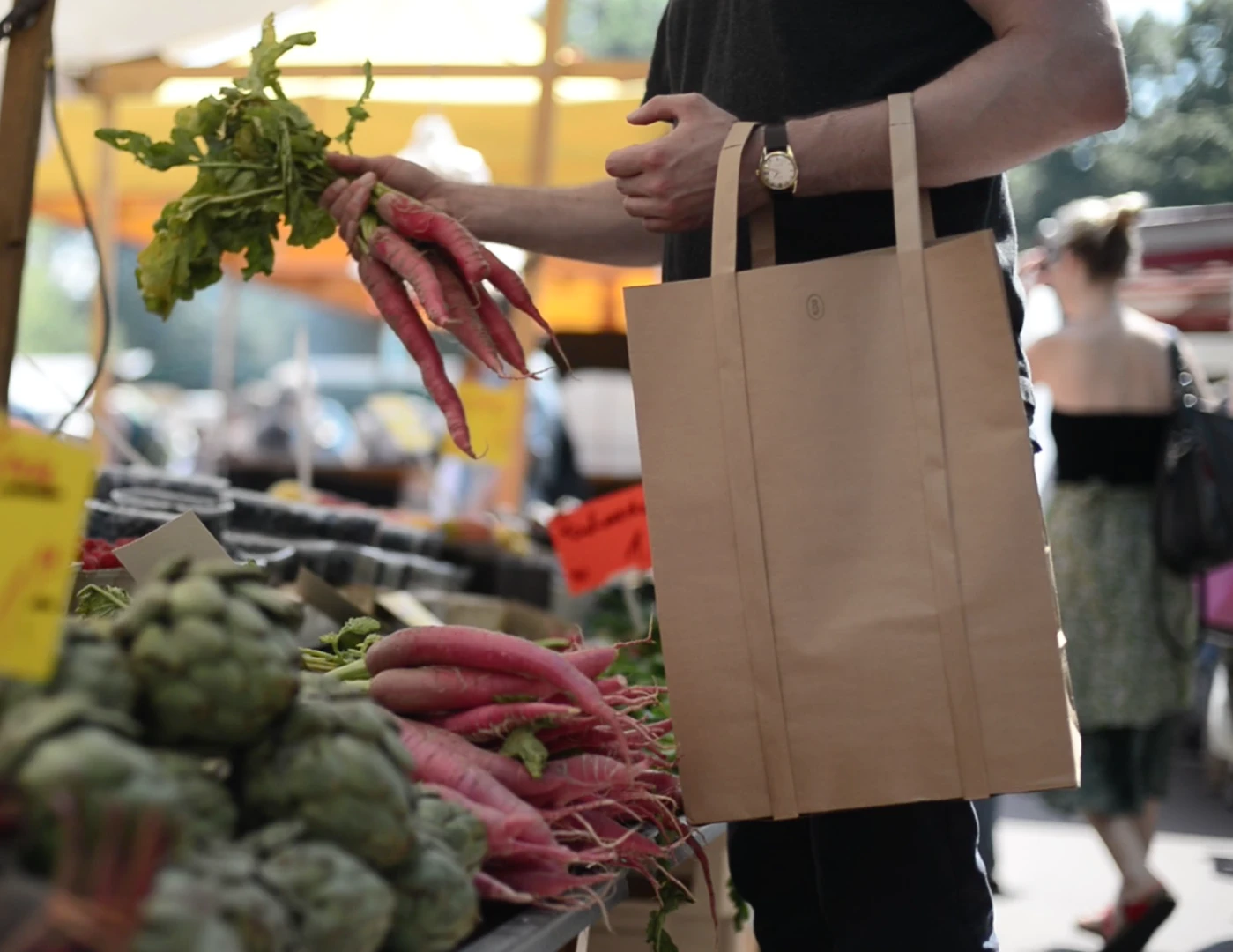 The PaperJohn can be worn as a backpack or carried like a plastic carrier bag