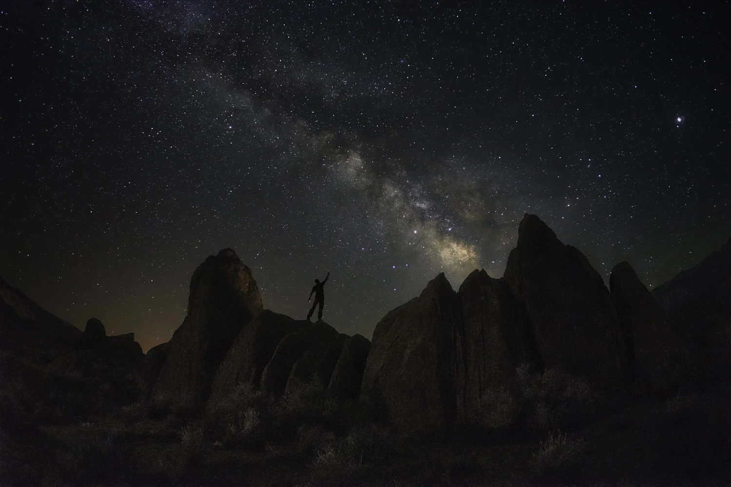 YOUNG TRAVEL PHOTOGRAPHER OF THE YEAR 15-18 CATEGORY.RUNNER-UP: Nayana Rajesh, USA (age 16)Lone Pine, California, USAI took this photo in the summer of 2018 in Lone Pine, California during a trip with my dad and his friends. It was a thrilling experience for me to be under truly dark skies and to be able to see the night sky in all its glory.Sony SLT-A99V, 16mm fisheye lens, f2.8, 20 sec, ISO 3200
