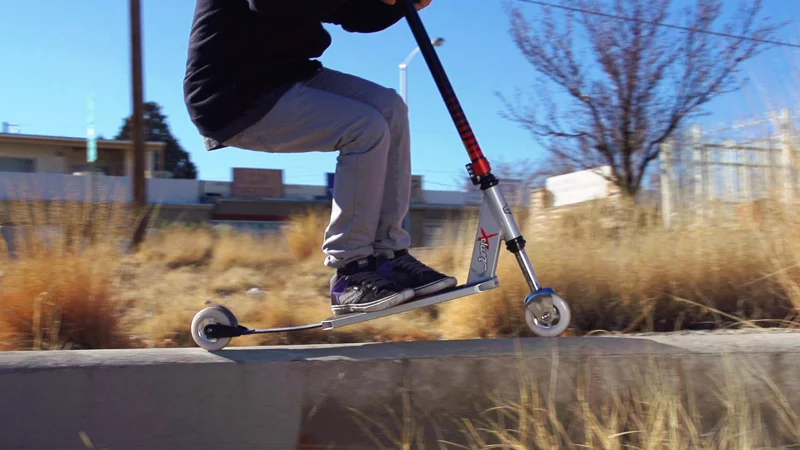 Riding the JumpX on a curb