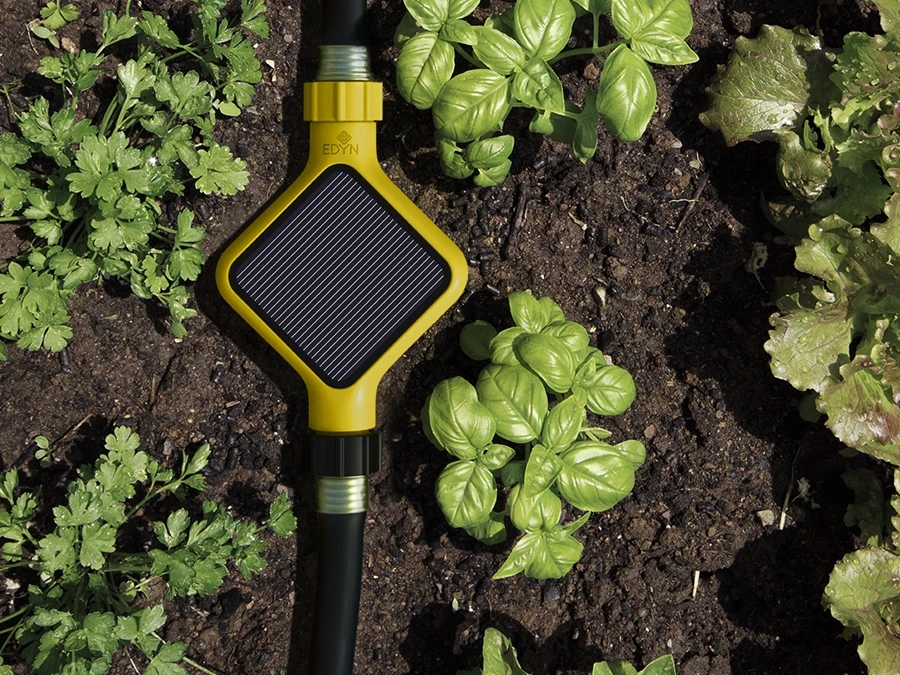 The Edyn Water Valve fits most hose and sprinkler connections and automatically waters the garden when required