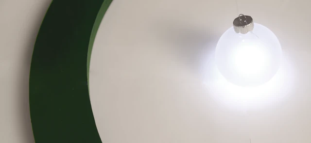 The Aura Power Ring transmits power wirelessly to the LED ornaments