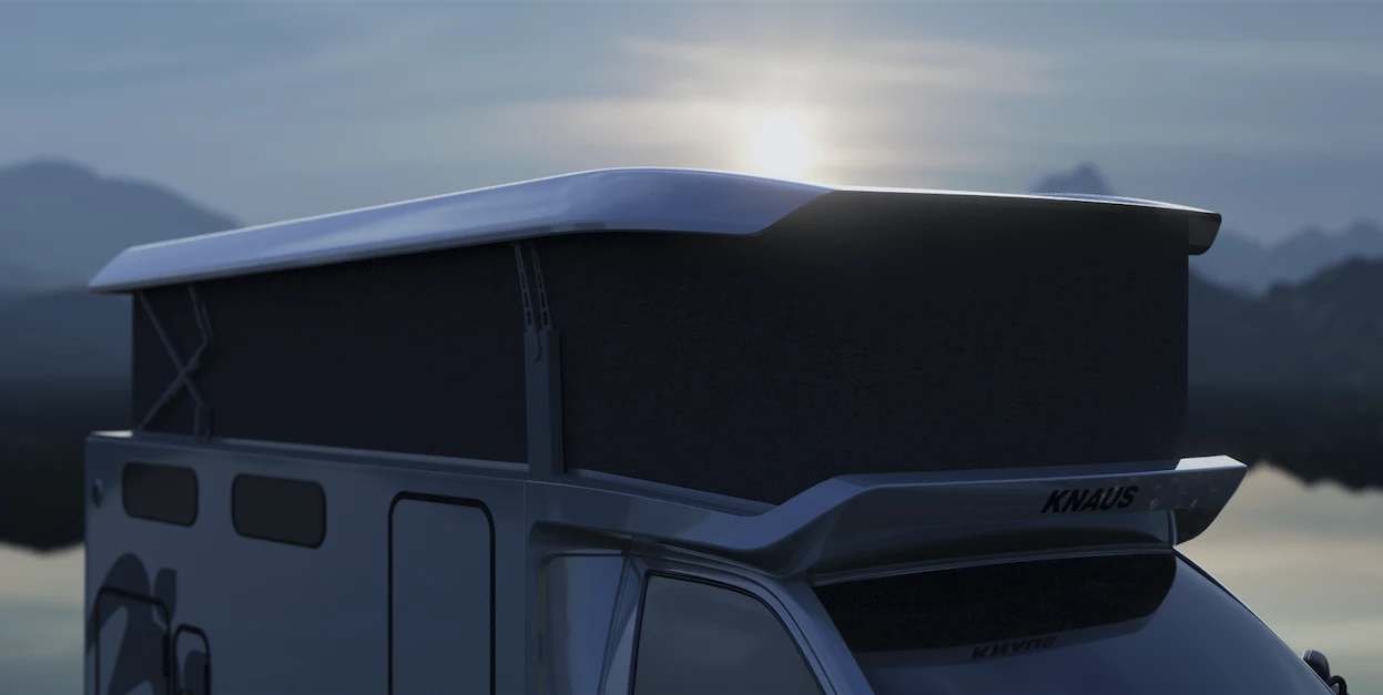 The pop-up roof lets the Tourer CUV maintain a low ride height and 2 full meters of interior headroom