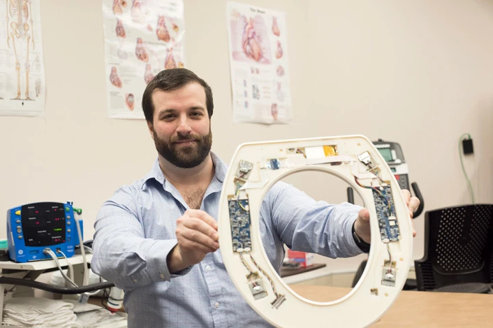 Nicholas Conn with one of the prototype toilet seats