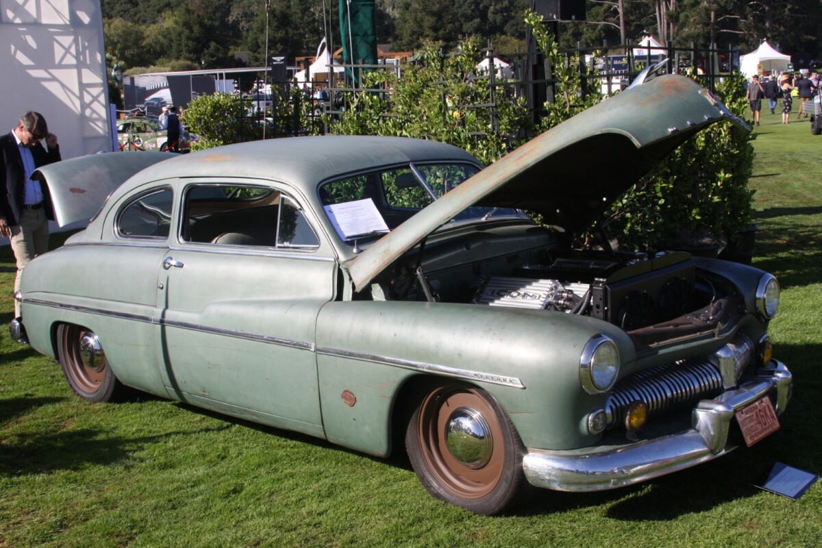 This 1949 Mercury ICON Derelict EV is one of the most unique automobiles you'll ever see. On the outside it sports a 70-year-old body with original paint, but on the inside it has a custom four-wheel-independent Art Morrison chassis, electric rack-and-pinion power steering, two 150kW motors and a full Tesla performance battery pack