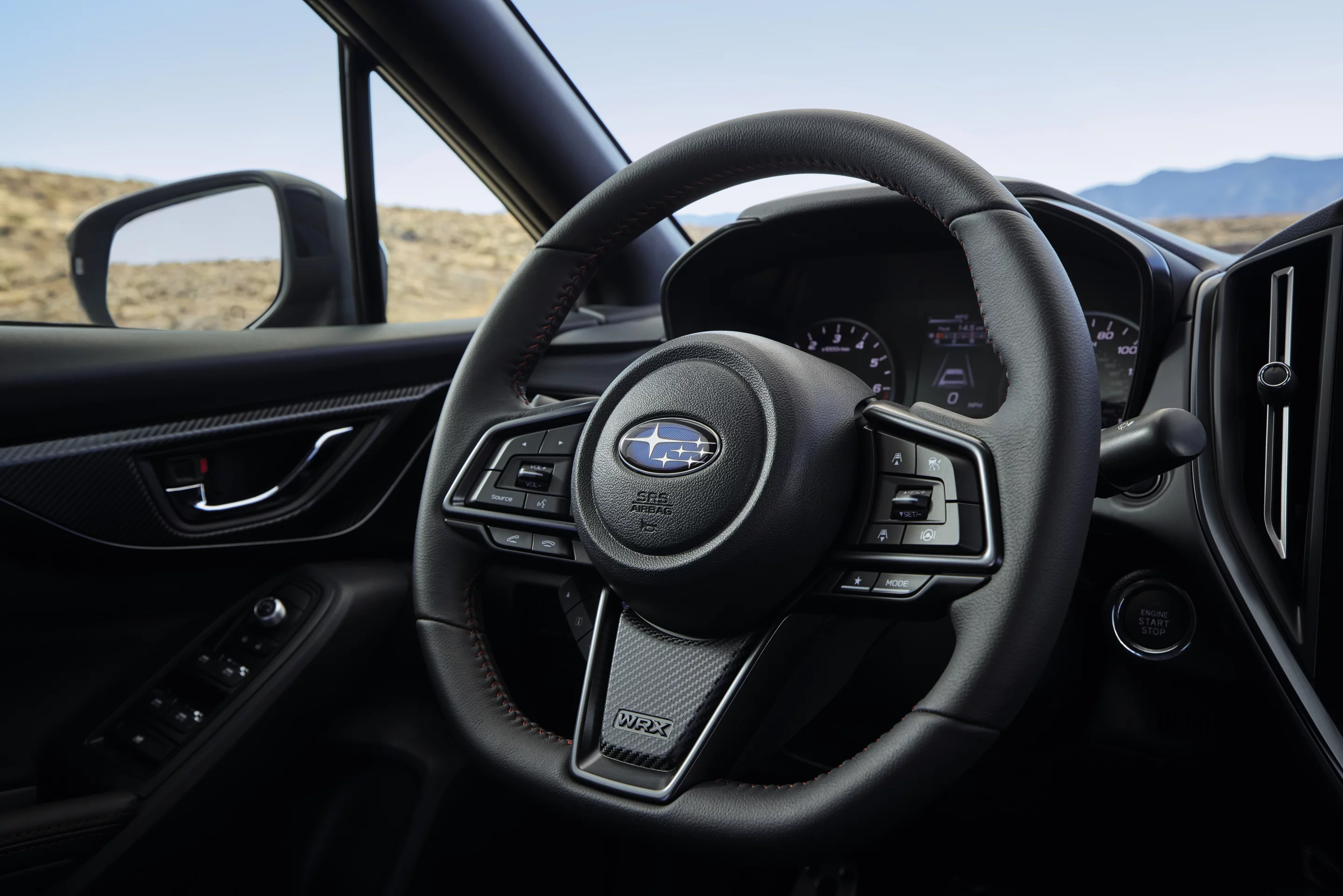 The signature Subaru WRX flat-bottomed, leather-wrapped steering wheel is standard in the 2022 model