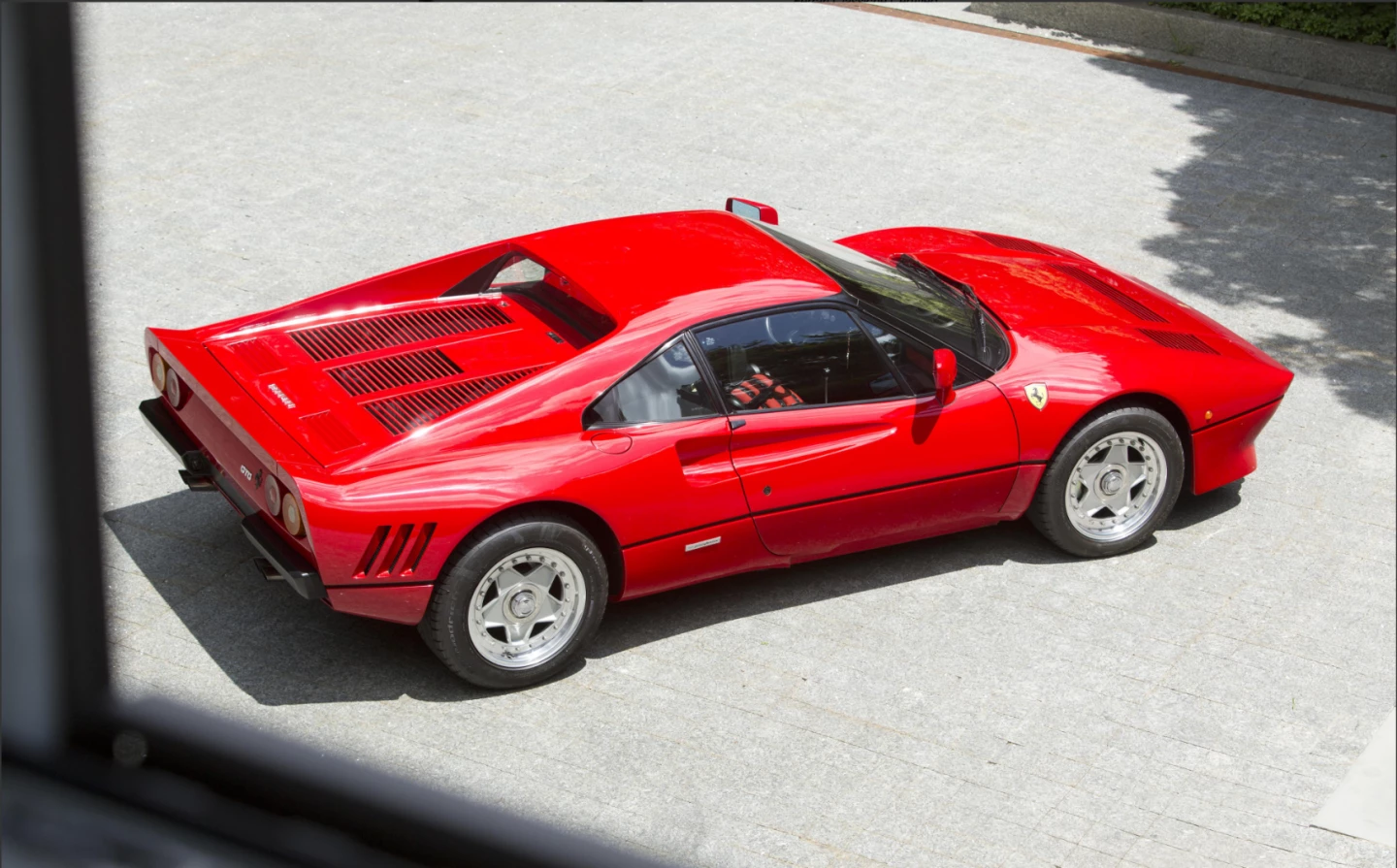 Everyone knows about the mythical Ferrari 250 GTO and the astronomical prices the car commands. The GTO was made in very limited numbers and they are so balanced, powerful, drivable and rare that they now sell for beyond $50 million dollars. Ferrari didn't use the magical GTO (Gran Turismo Omologato) moniker a second time for no reason. The 288 GTO is an extraordinary car built to go racing and when the FIM abolished its intended racing category, it never got to demonstrate just how good it really was on the racetrack. Its greatest fault is that it isn't nearly as rare as the original 250 GTO, with 272 cars made versus the 39 of the original GTO. Just the same, the entire production run was sold before production even started. It may not have quite the exclusivity or as much time in the marketplace as the original (being made in 1984-1985 compared to the 250 GTO's production period of 1962-1964), but it's better looking than its dad, much faster (188 mph/303 km/h) and a genuine driver's car. Prices for the 288 GTO at auction have escalated dramatically since 2012.