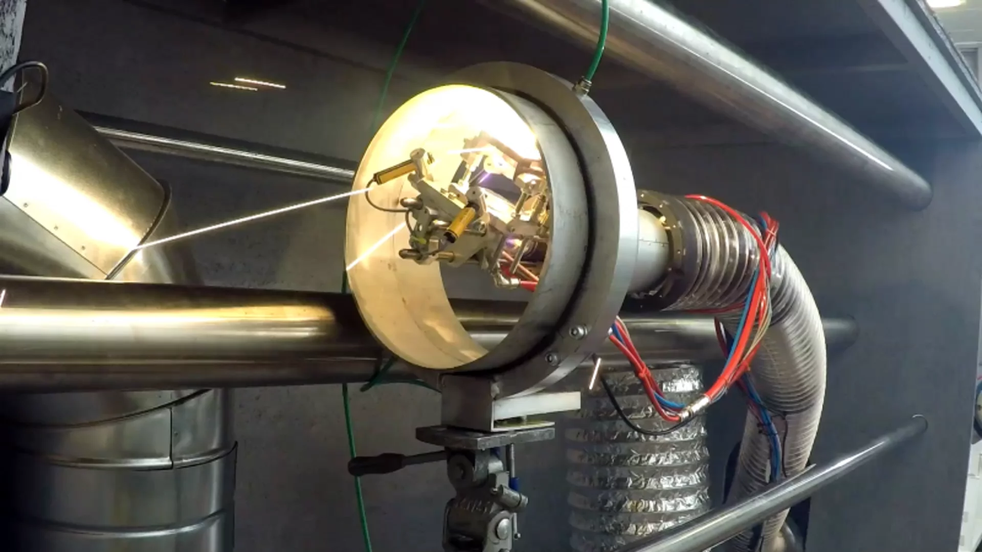 LaserPipe welds inside a pipe using an industrial laser head