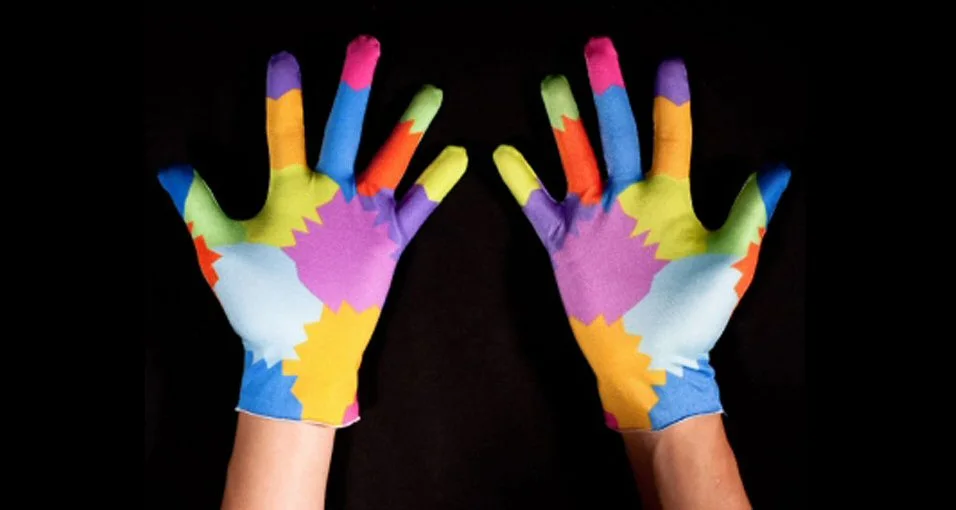 MIT researchers have unveiled a cheap and easy to use gesture recognition system which uses a colored glove, a webcam and some software with positive results