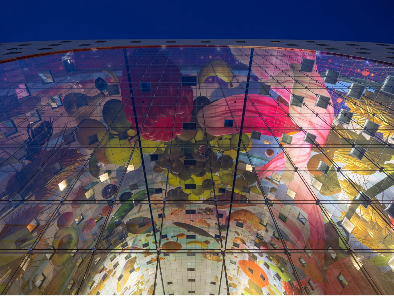 An 11,000 sq m (118,403 sq ft) mural covers the inside of the Markthal arch