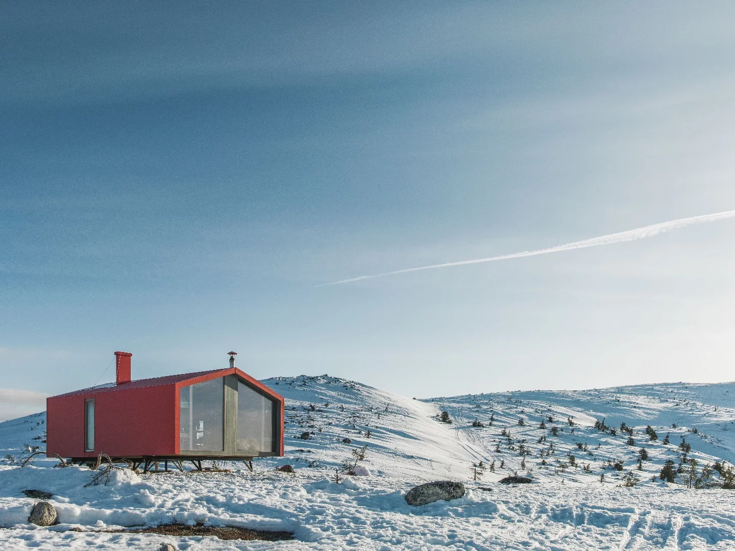 The cabin is raised off-the-ground on six stilts