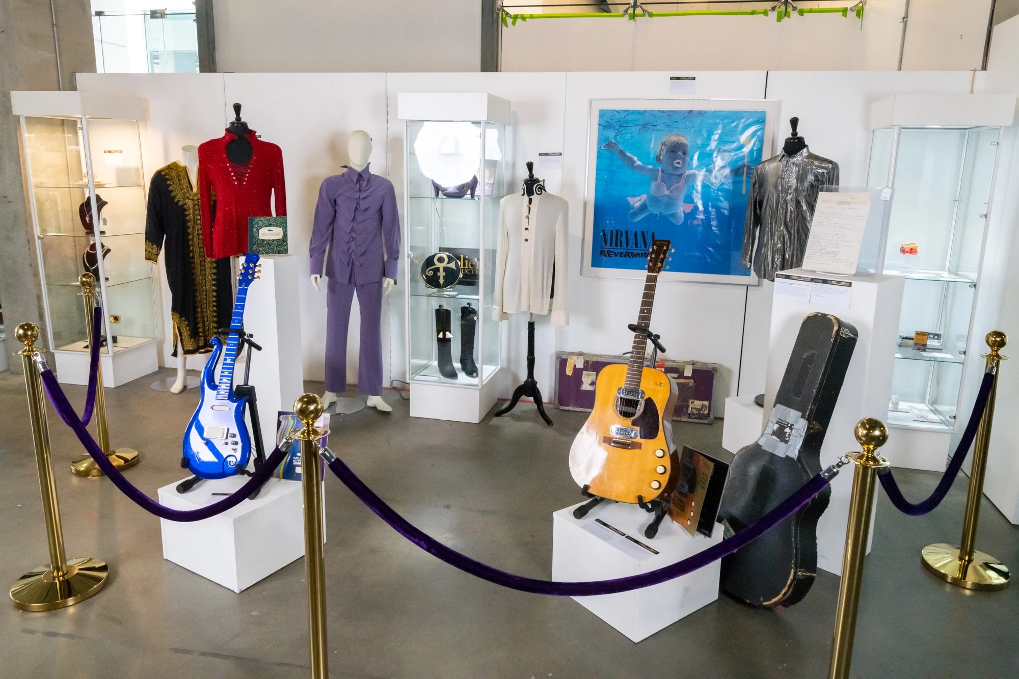 Two of the top 25 most valuable guitars in history sold at the same auction. At left is Prince’s long-lost primary performance Cloud Guitar that sold for $563,500 on 19, June 2020. At right is Kurt Cobain’s “MTV Unplugged" Martin D-18E guitar that sold for $6 million on 20 June, 2020