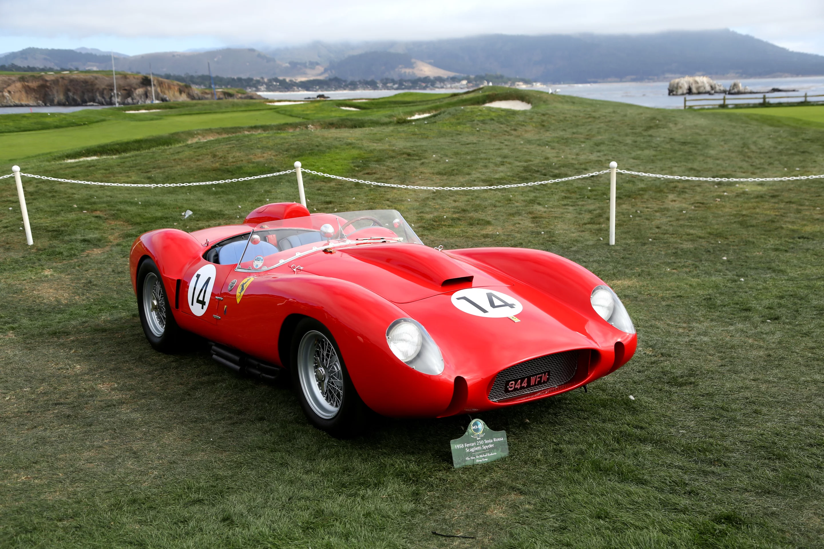 A red 1958 Ferrari 250 Testa Rossa Scaglietti Spyder rests with the Pacific in the background (Photo: Angus MacKenzie/Gizmag.com)