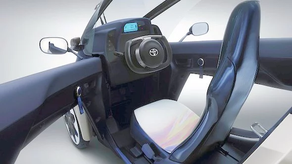 Entry into the i-Road's front seat is unobstructed