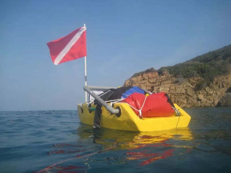 Schweizer's first design was a little, towable cargo boat