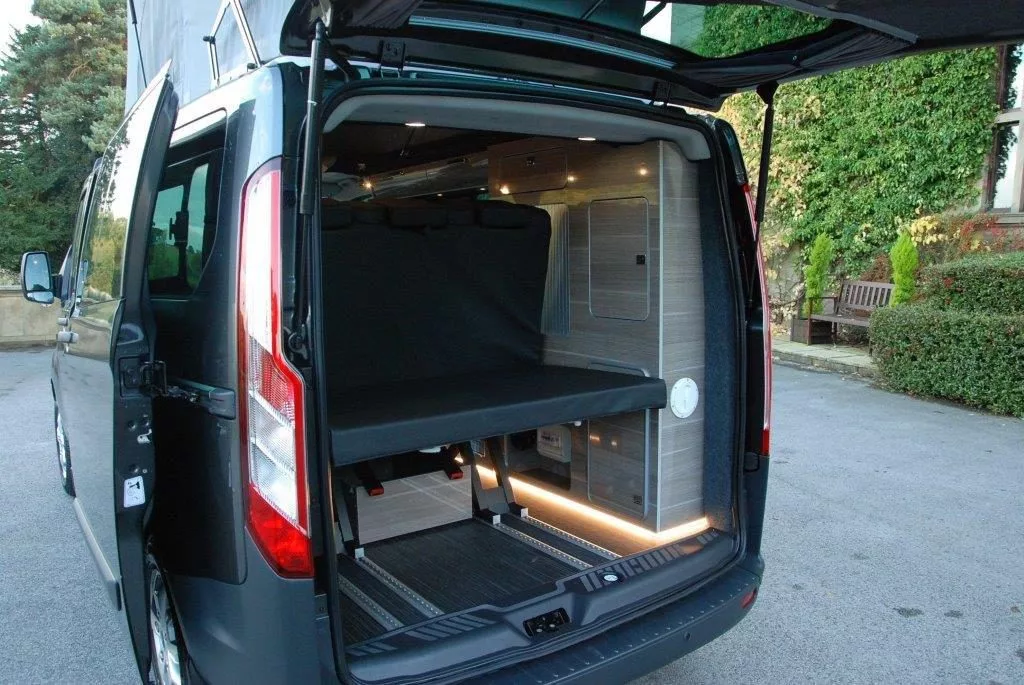 The bed design cuts into some of the load area, but the van still has room for groceries, luggage and other cargo
