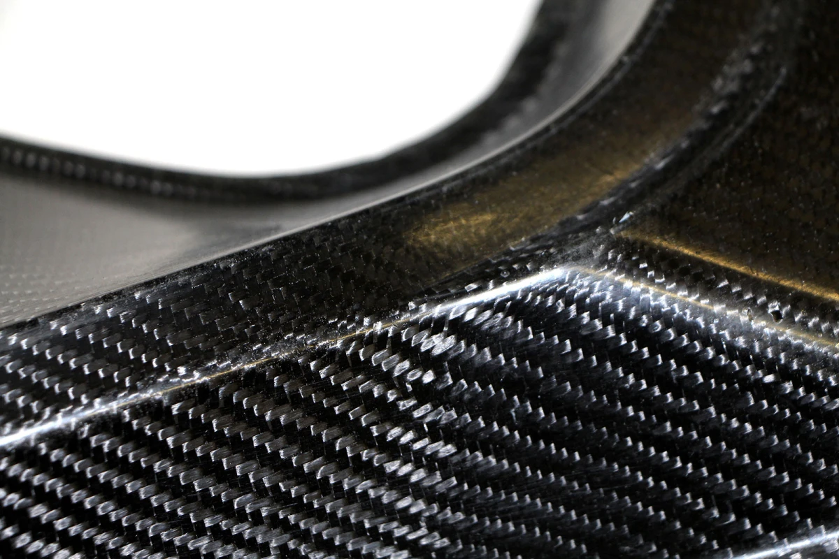 A carbon and hemp-fiber reinforced component such as this is a cheaper, greener hybrid composite that can do the job of pure carbon composites(Image: Fraunhofer)