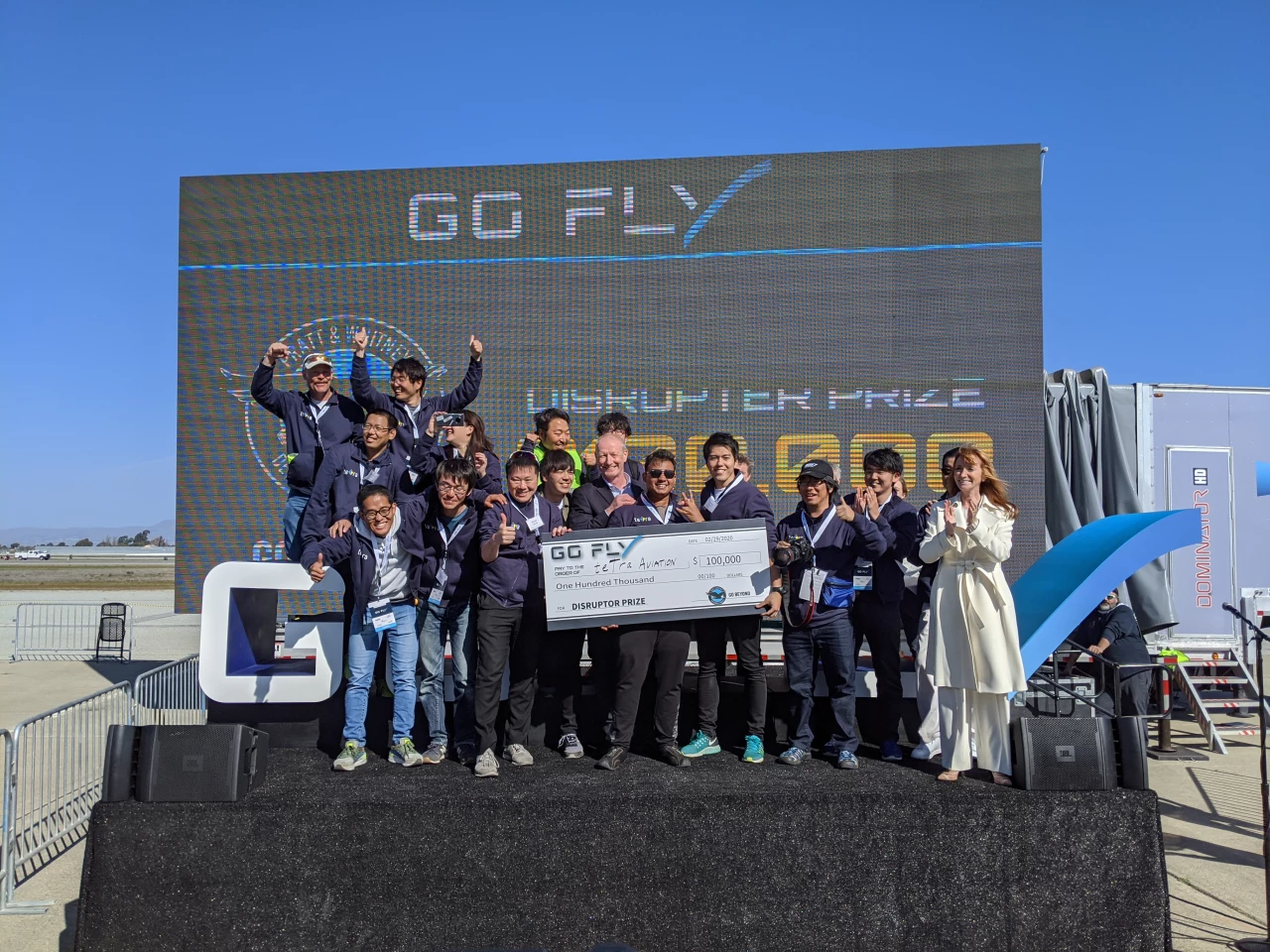 Japan's Tetra Aviation team celebrates its US$100,000 win