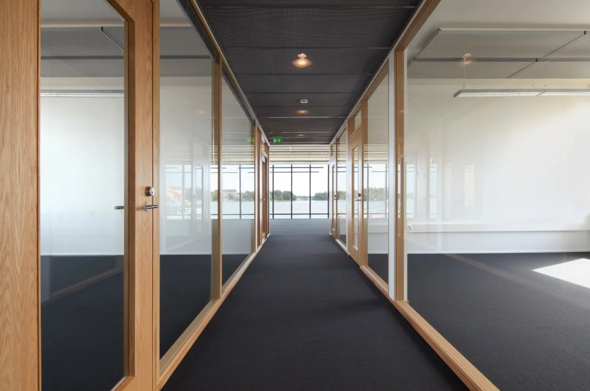 The building features a series of different size offices, working spaces, meeting rooms and a personnel café