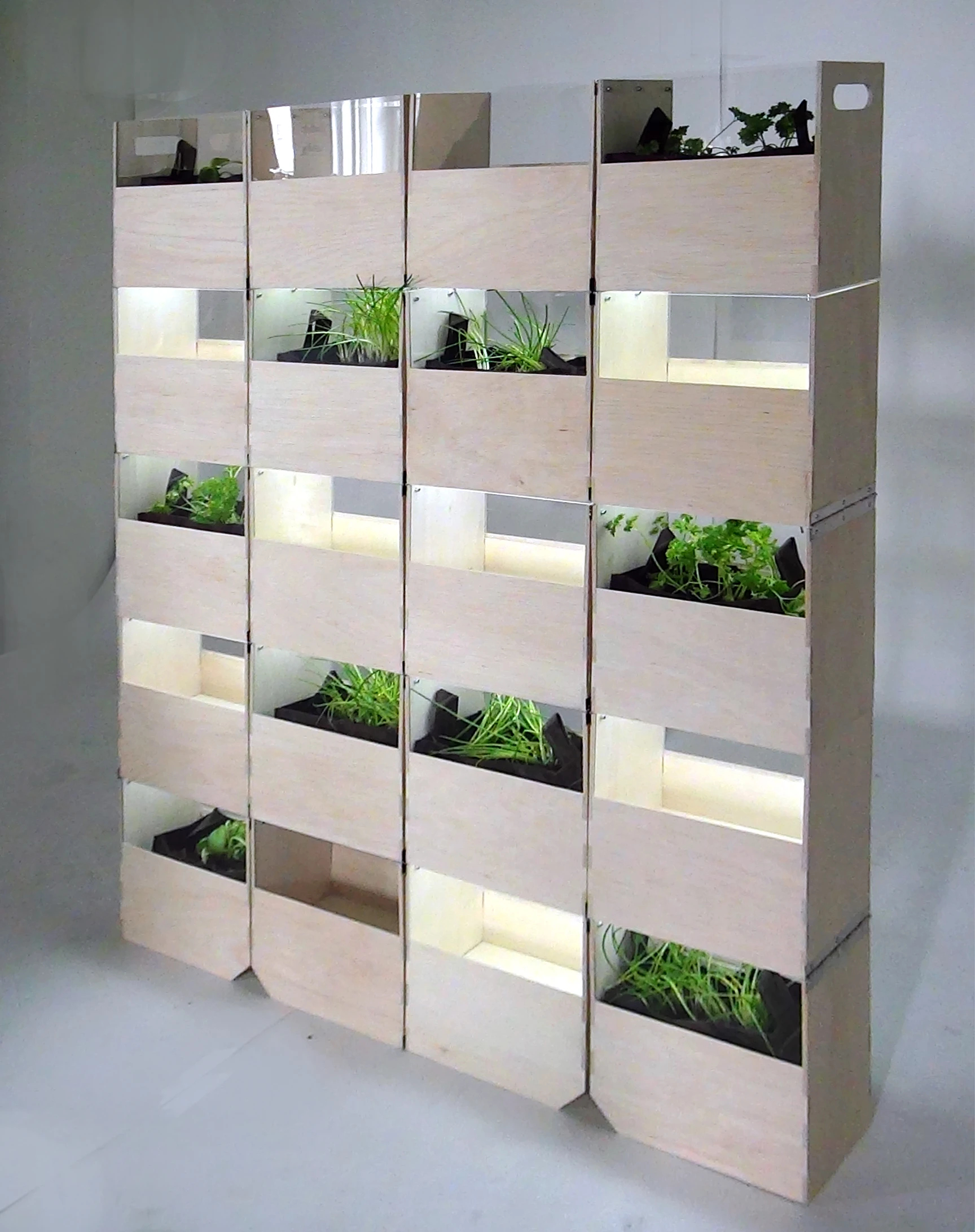 In its resting position, Herb 2 just looks like a stack of boxes used to break up a living space