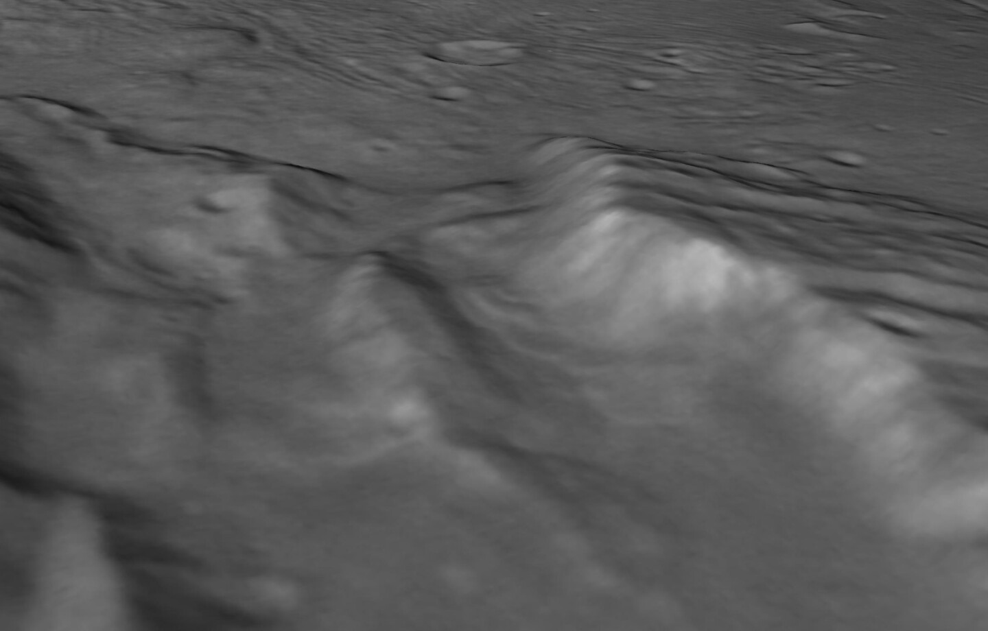 New Horizons image showing signs of long run-out landslides on Pluto's largest moon, Charon.
